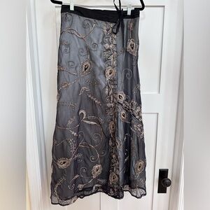 Sequined and beaded wrap skirt.